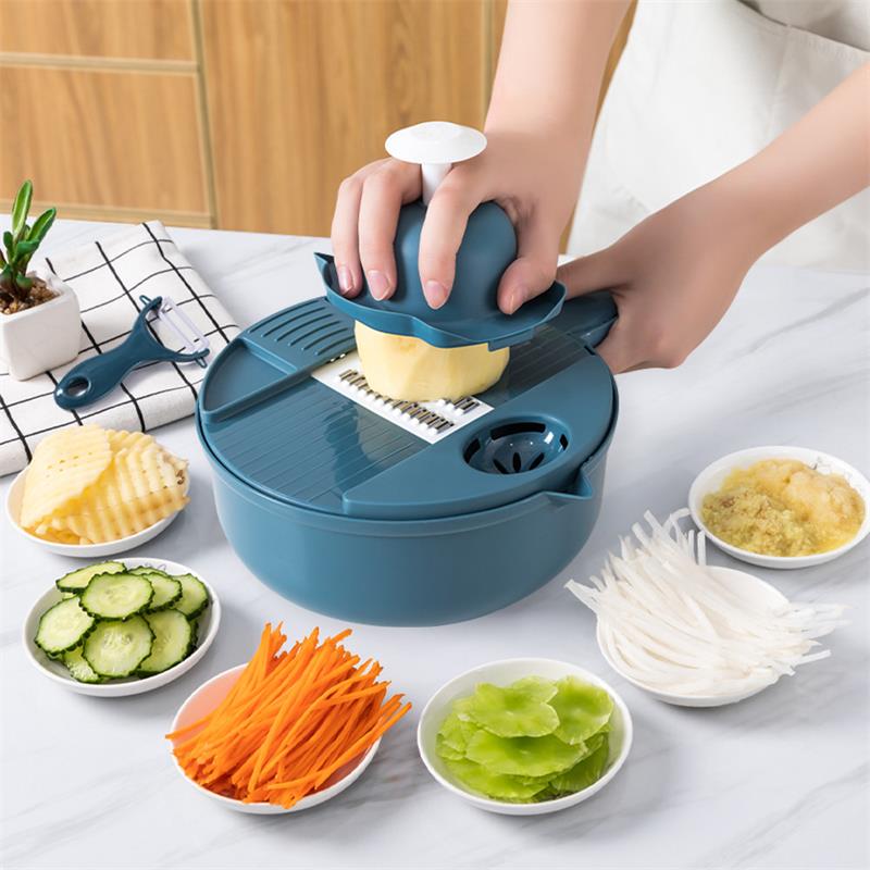 MULTIFUNCTIONAL KITCHEN UTENSIL - GRATE, SLICE AND MORE